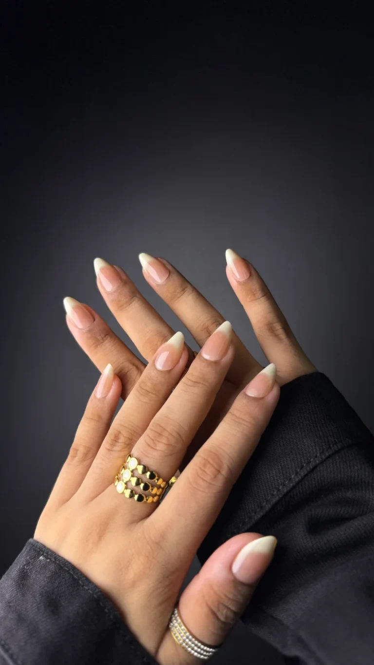 Hyper-realistic press-on nails with gold rings